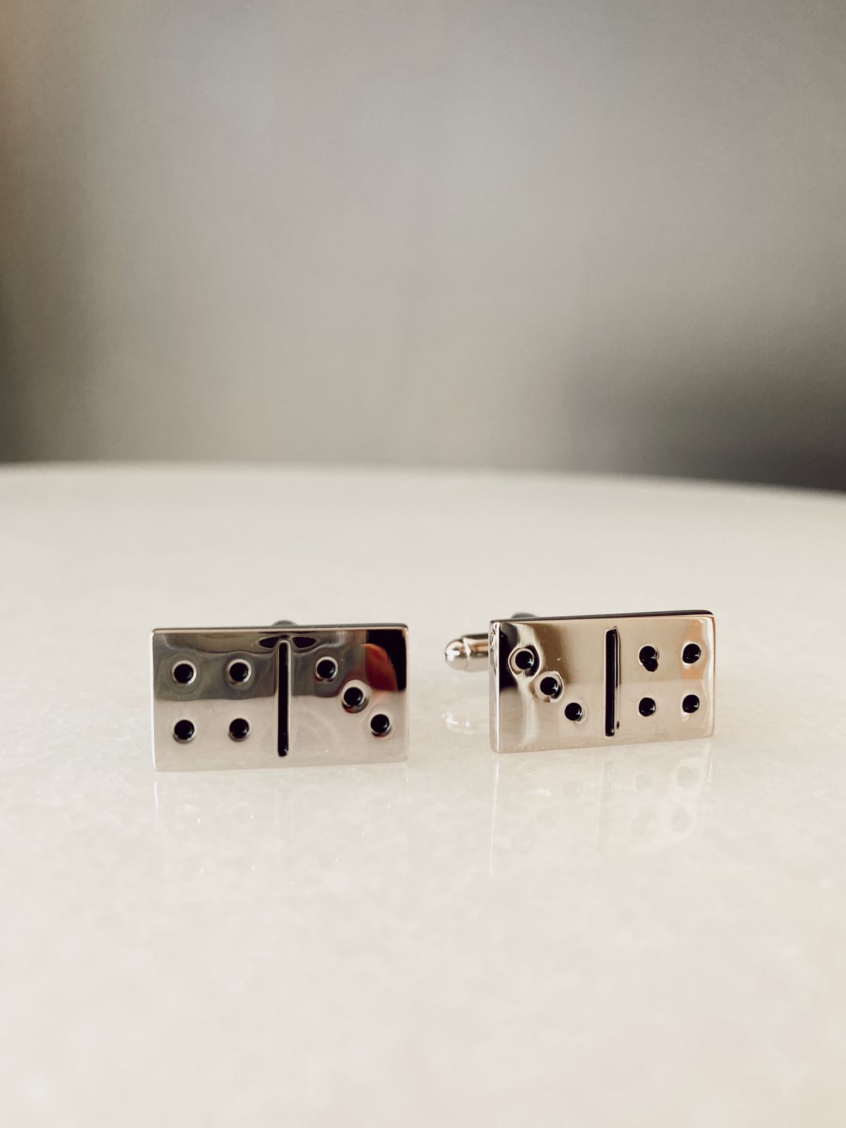 Mancuernillas Dominó